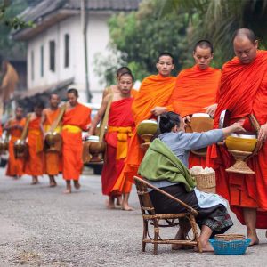 alms giving - laos travel packages