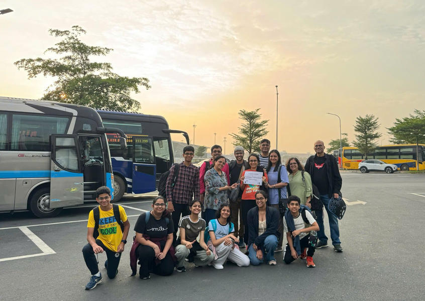 An Indian family visit Vietnam, checks in during a warm sunset