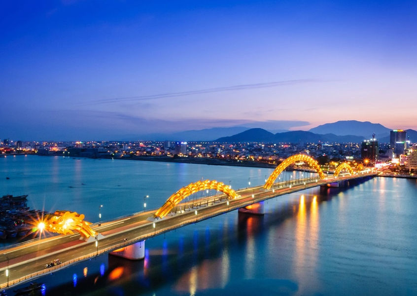 Dragon Bridge illuminated at night over Han River Da Nang