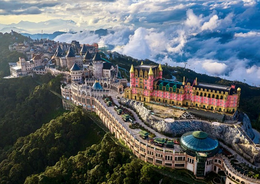 Aerial view of Ba Na Hills French Village castle above the clouds Da Nang