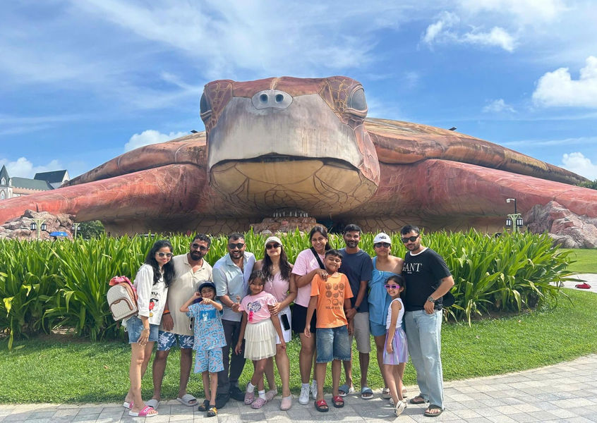 Indian family group photo at giant turtle attraction Phu Quoc