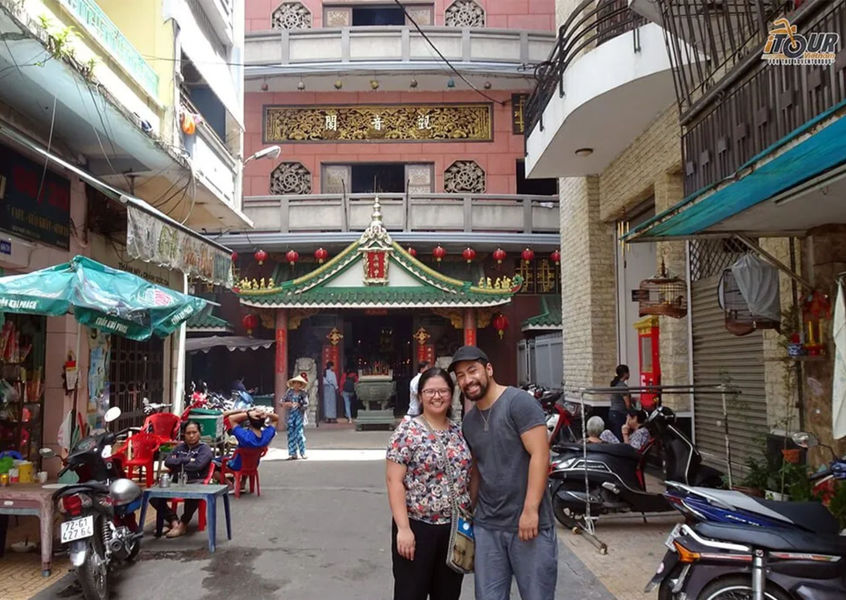 Couple posing at a temple in Ho Chi Minh City Chinatown