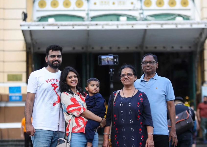 Multi-generation family visiting a Ho Chi Minh City landmark