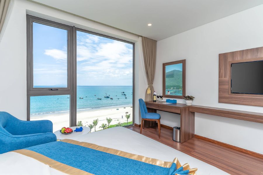 Beachfront hotel room with floor-to-ceiling window overlooking My Khe Beach