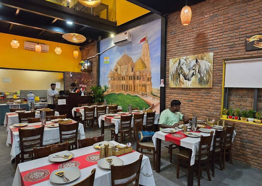 Gujarat Indian Restaurant Da Nang dining room with temple mural