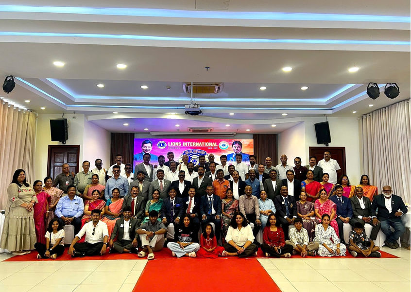 Large group photo at a Lions International conference hall