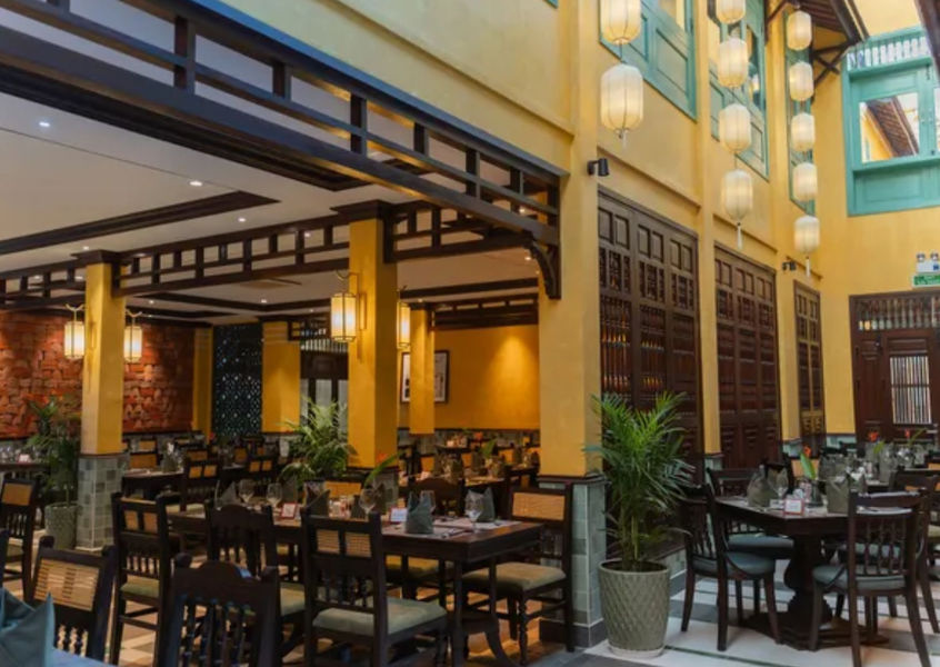 Rasoi Indian Restaurant Hoi An interior with wooden arches