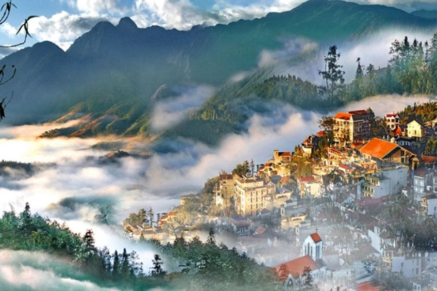 Sapa town at dusk blanketed in thick mist and clouds