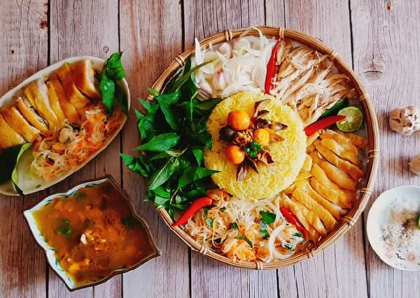 Hoi An chicken rice platter with herbs and pickled vegetables