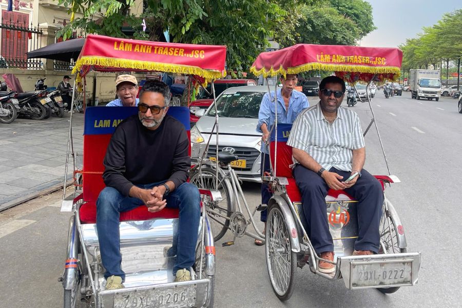 Cyclo tour for travelers in Hanoi Old Quarter, Vietnam
