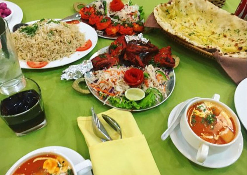 Tandoori chicken, rice and naan spread at Ganesh Nha Trang