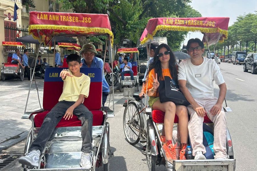 Family cyclo tour through Hanoi Old Quarter streets
