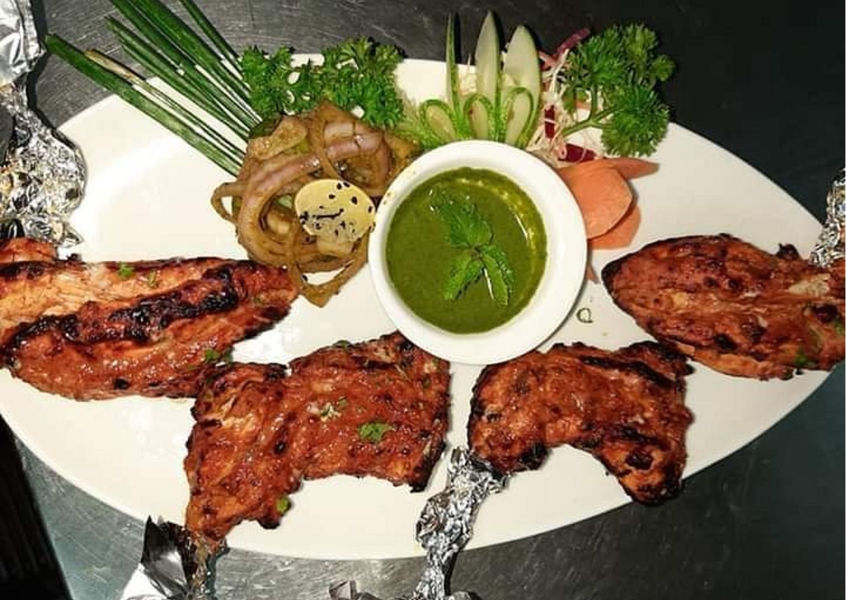 Tandoori chicken platter with mint chutney at Vandana Gastropub